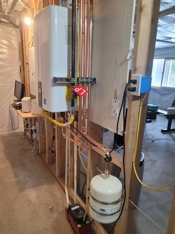 Licensed plumber repairing a kitchen sink in Duncan